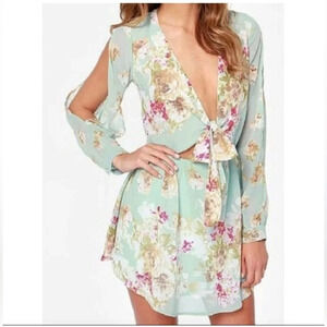 Cotton Candy LA romper cream floral print low cut  with a peek-a-boo tummy sexy